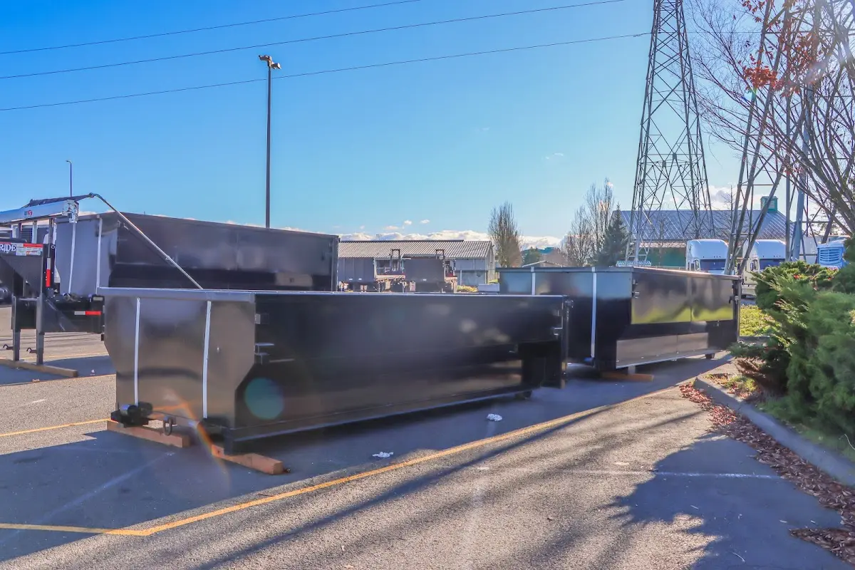 Roll-off dumpster ready for waste disposal at job site for Roofing Dumpster Rental in Tea